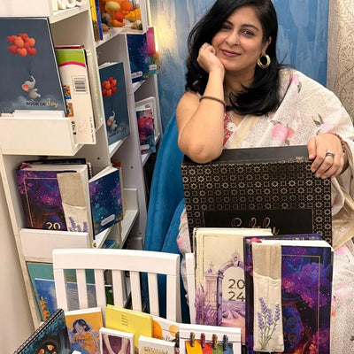 A TTE community member with her Little Black Box collection